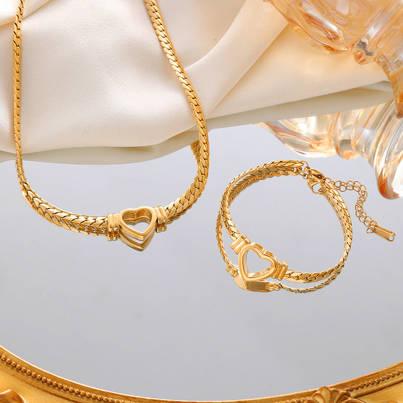 **Love Necklace & Bracelet** – Elegant **heart-shaped jewelry** with a sleek **Cuban chain**. Made from **stainless steel** with an **electroplated finish**, it's stylish, durable, and comfortable to wear. Perfect for any occasion or as a heartfelt gift. 💖