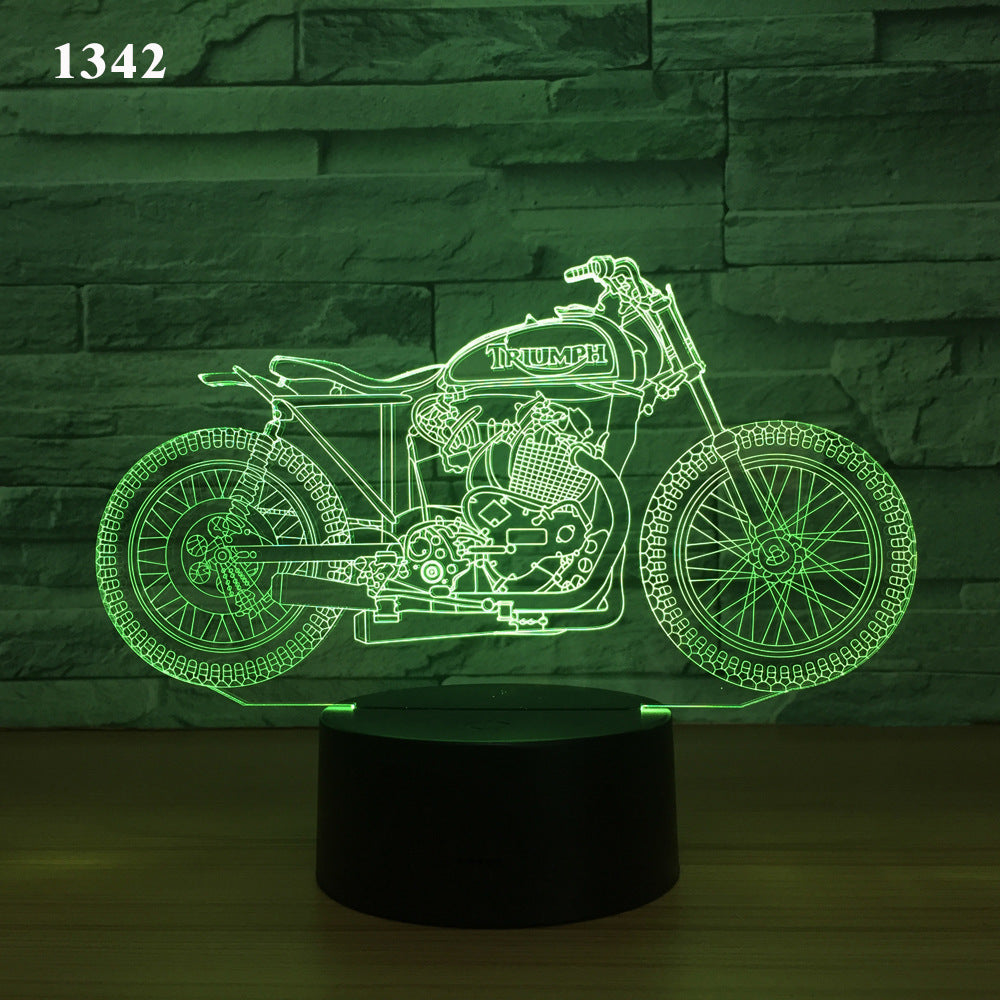 Motorcycle LED desk lamp with a black background and colorful touch controls, featuring an acrylic shade for a sleek and modern look. Ideal for home, hotel rooms, corridors, and entertainment spaces.