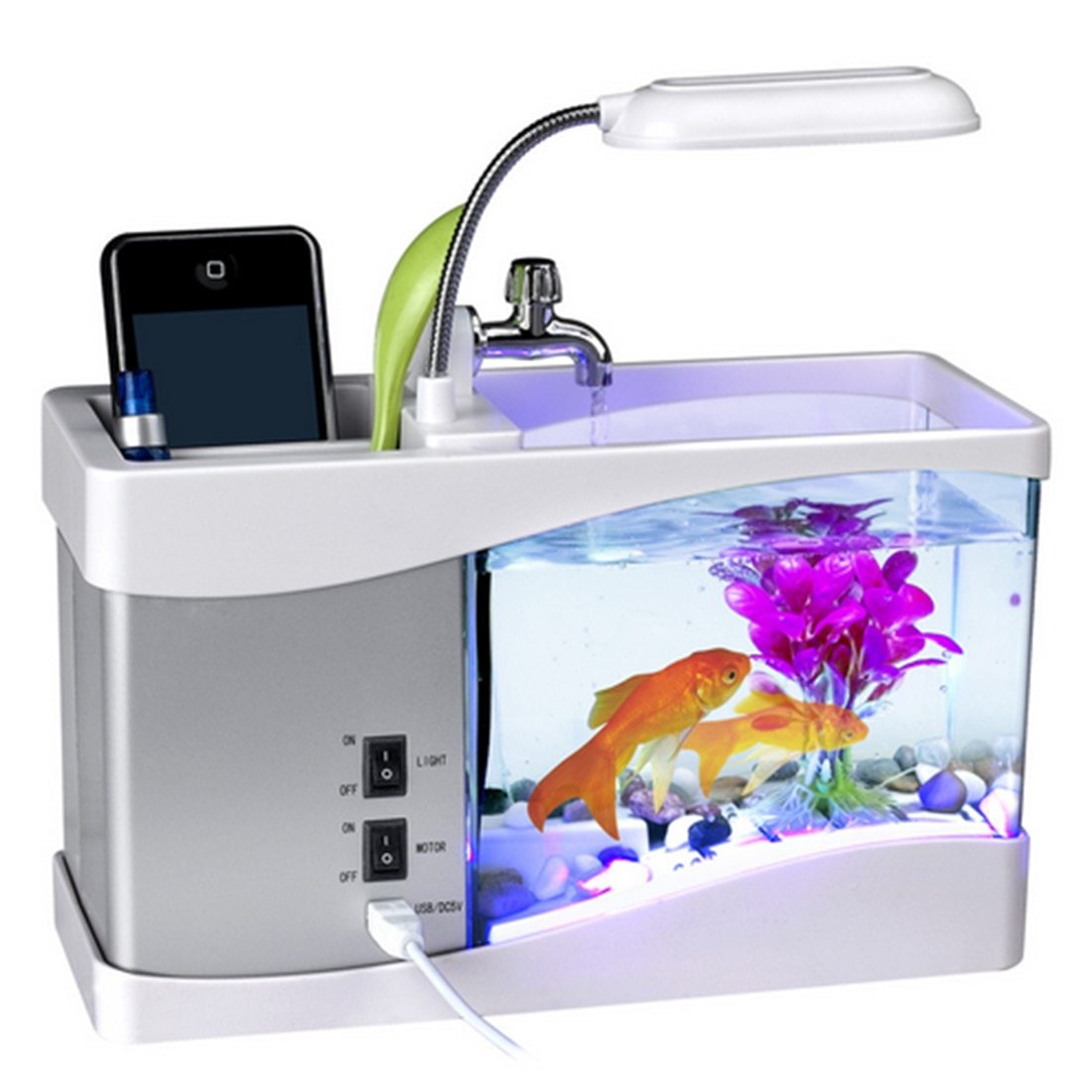 "Mini Aquarium Office Desk Organizer β A multifunctional desk accessory featuring an aquarium, LED table lamp, calendar, alarm, and pen holder, complete with small pebbles and a plant, creating a calming workspace atmosphere."