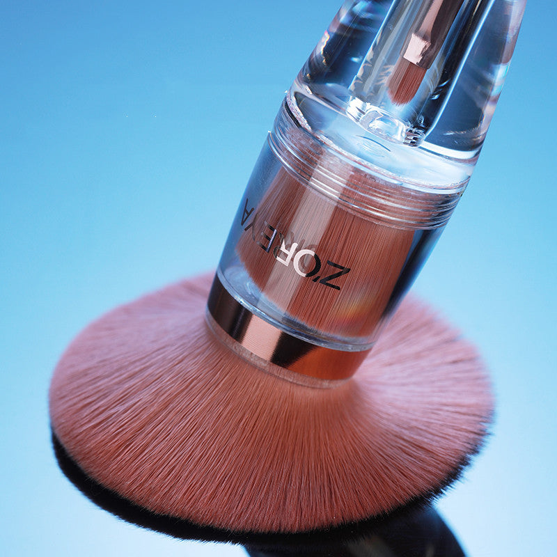Zhuoerya 9-piece makeup brush set with transparent acrylic handles, featuring man-made fiber bristles for smooth application. Short rod handles for comfort and control, with an overall length of 22.5 cm.