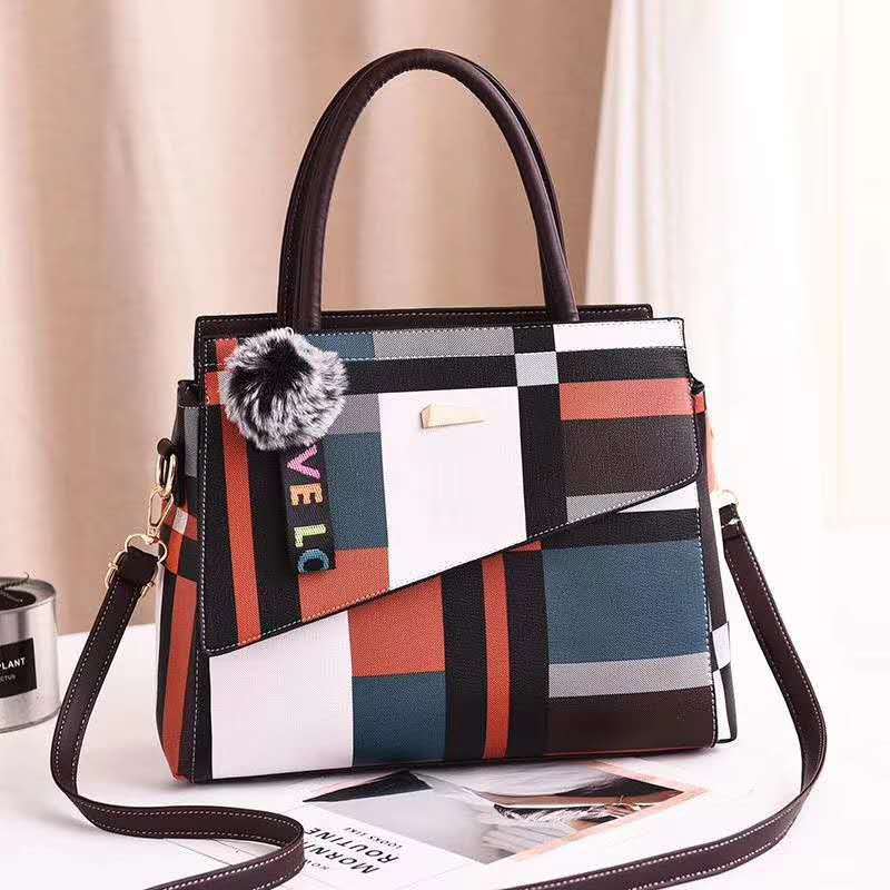 Stylish ladies one shoulder bag in two sizes (small and large), featuring a sleek design with a portable handle. Perfect for carrying essentials with a modern, elegant touch.