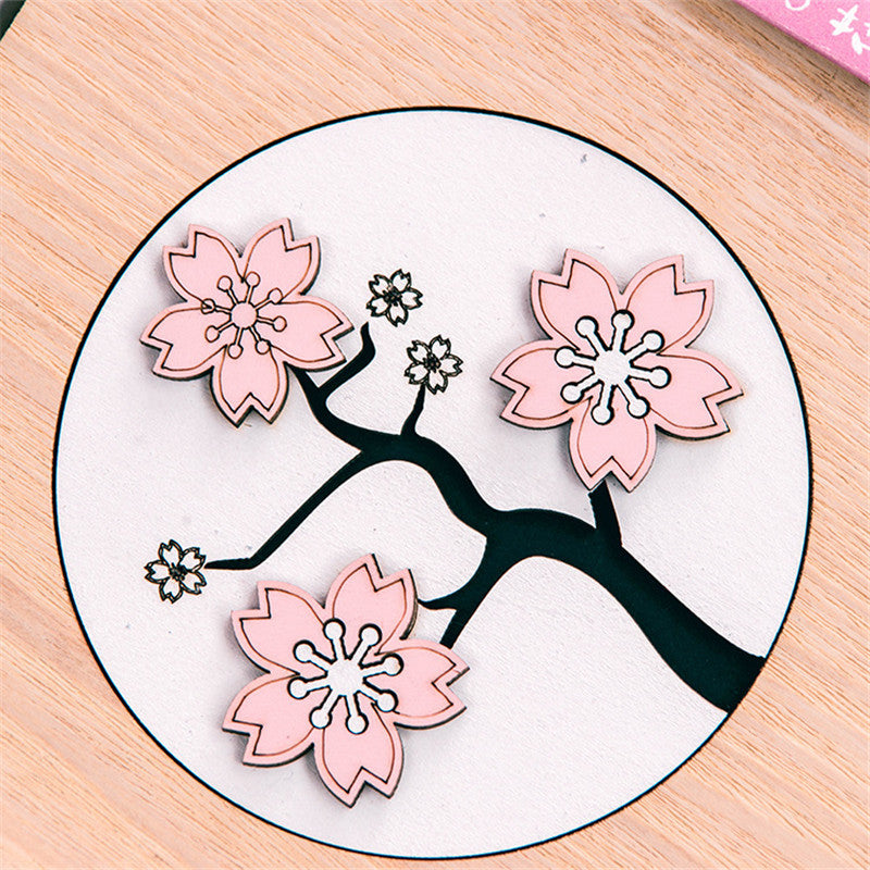 Creative Sakura Notebook Set with carved wooden cover, eco-friendly paper, and crystal bookmark.