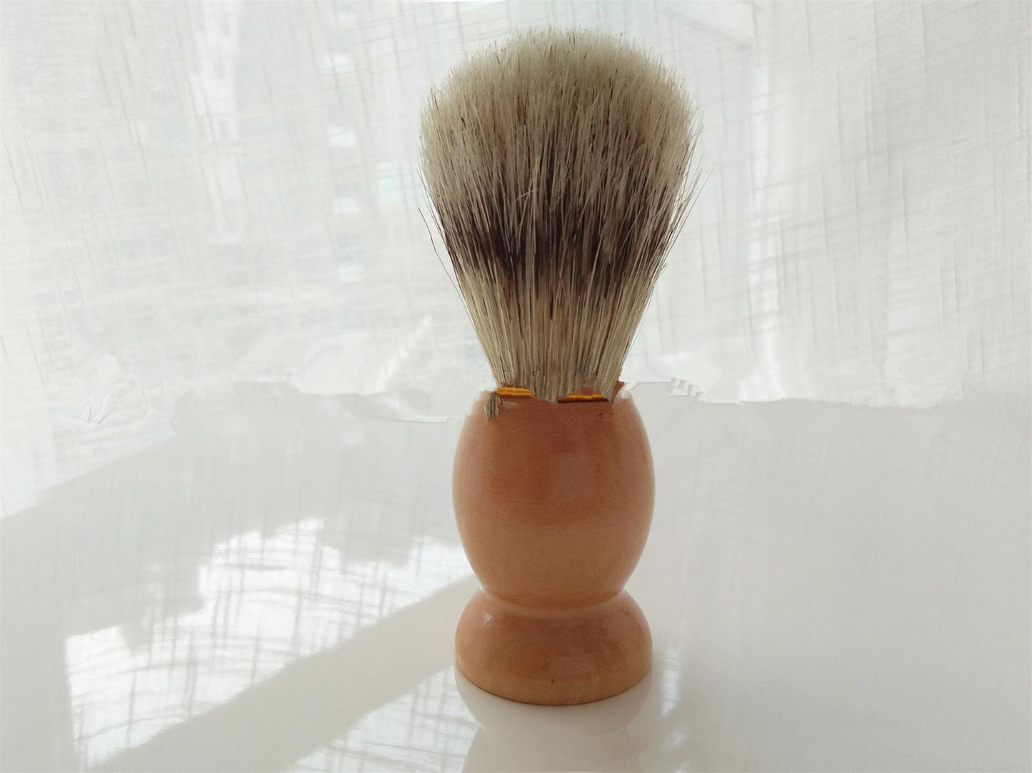 Men's shaving set featuring a metal brush and razor holder made of Fe-Ni alloy, a stainless steel double-layer shaving soap bowl, a 3-layer imported blade razor with a wooden handle, and a bristles shaving brush made from natural bristles. Available in two styles: one with a spare blade and another with two spare blades.