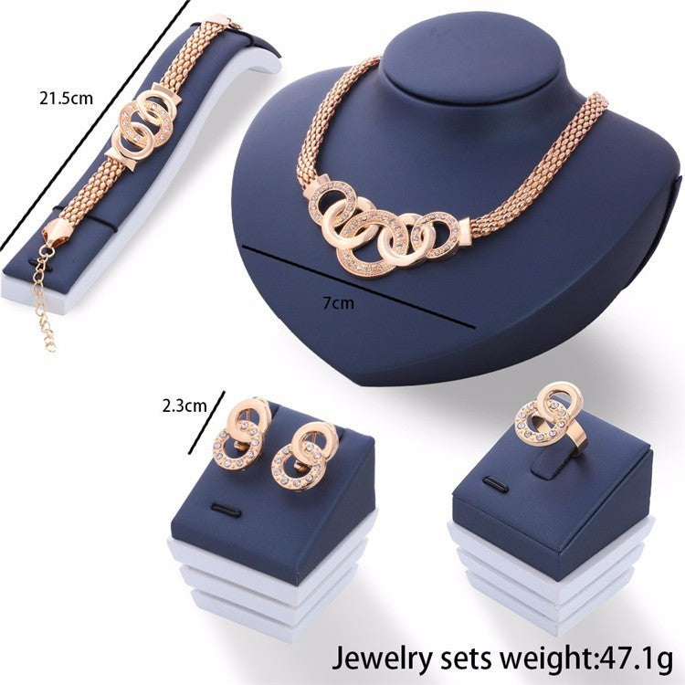 4-piece couple-style jewelry gift set featuring rhinestone earrings, hand accessories, and item accessories with alloy inlaid artificial gems and semi-precious stones. Includes a stylish horsewhip chain.