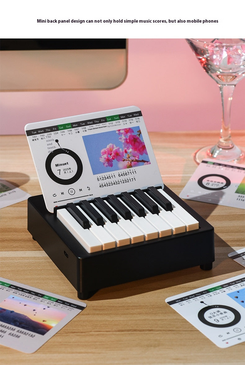 Mini retro-style piano toy in white or black, featuring 24 brief piano scores of world-famous pieces. Packaged in a gift box, perfect as a musical gift or decorative piece.