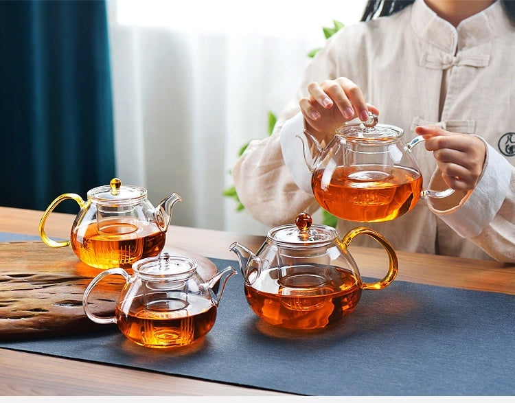 Teapot tea set for household use, featuring a 1000ML hand-painted heat-resistant glass teapot with an option to include 6 matching cups in a simple style design.