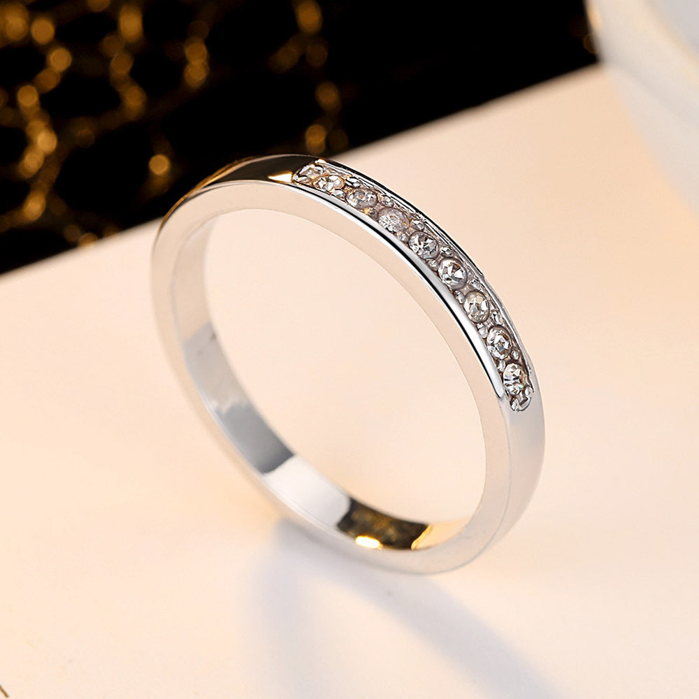 Elegant set of geometric copper rings adorned with sparkling zircon stones, offering a perfect blend of modern style and timeless sophistication.