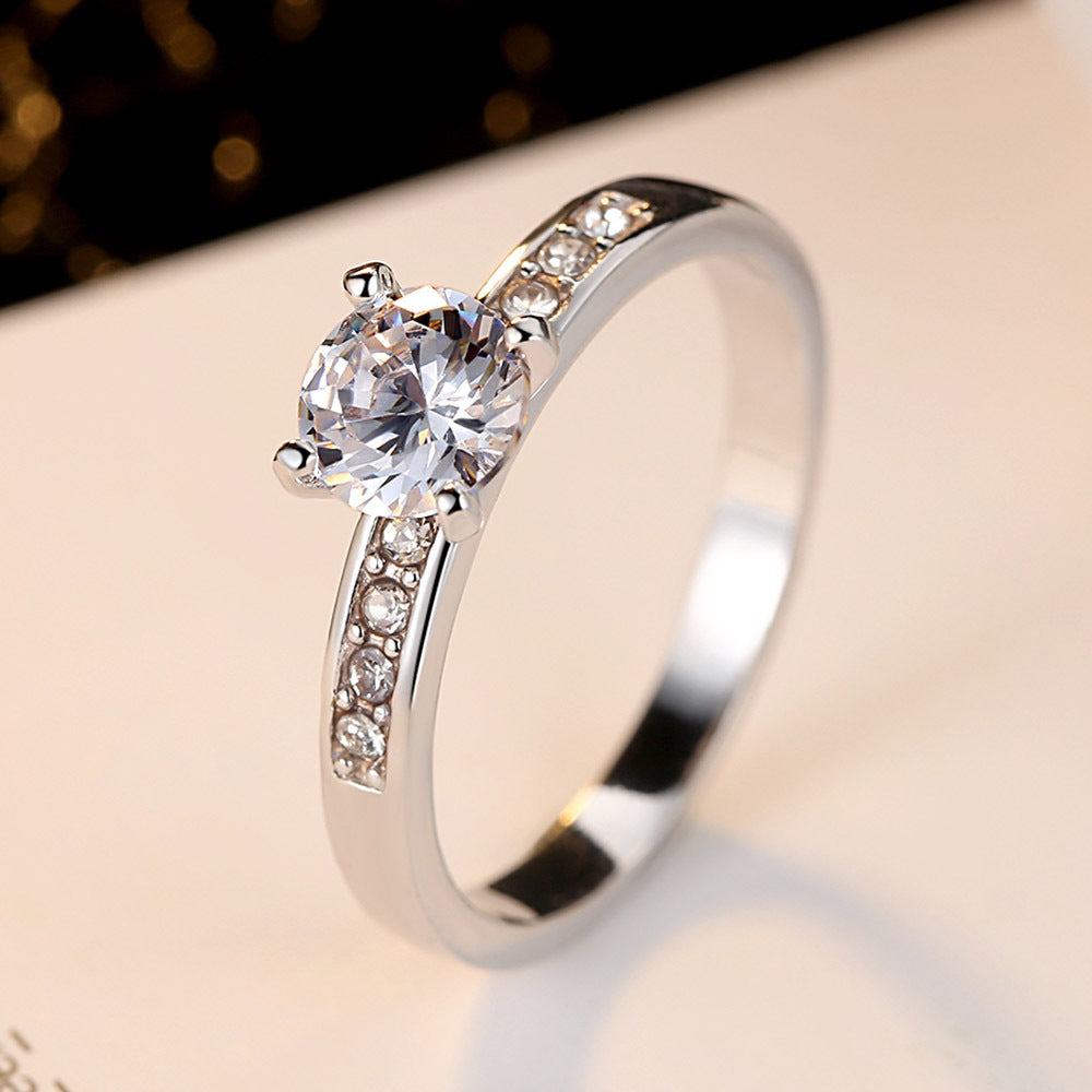 Elegant set of geometric copper rings adorned with sparkling zircon stones, offering a perfect blend of modern style and timeless sophistication.