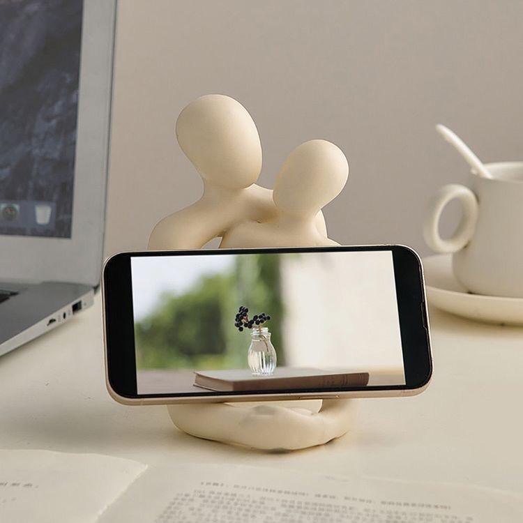 **Heartwarming Loving Couple Statue – A Beautiful Symbol of Love ❤️** A stylish, modern design crafted from **high-quality plastic and resin**. Available in **Milky White** and **Gold**, it makes the perfect **festival gift** for couples. Ideal for weddings, anniversaries, or simply celebrating love. Adds an elegant, minimalist touch to any space. 🌟