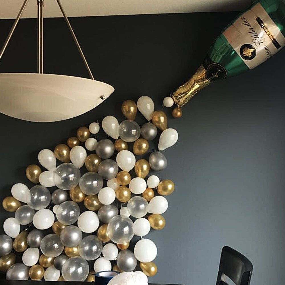 Birthday Party Balloon Decoration set in golden color includes a large wine bottle, 10 golden balloons, 10 silver balloons, 20 gold glitter balloons, and a golden ribbon. Perfect for festive celebrations!