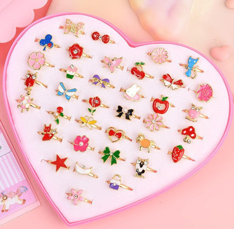 Birthday Gift for Little Girl featuring a Diamond Set Alloy Ring with 36 adjustable rings in a heart-shaped box. Perfect for encouraging creativity and style!
