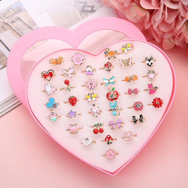 Birthday Gift for Little Girl featuring a Diamond Set Alloy Ring with 36 adjustable rings in a heart-shaped box. Perfect for encouraging creativity and style!