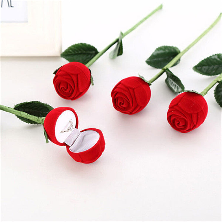 "Red Rose Flower Ring Gift Box β An elegant jewelry box featuring a romantic red rose design, perfect for showcasing rings, cuff links, earrings, and other small jewelry. Ideal for special occasions and thoughtful gifting."