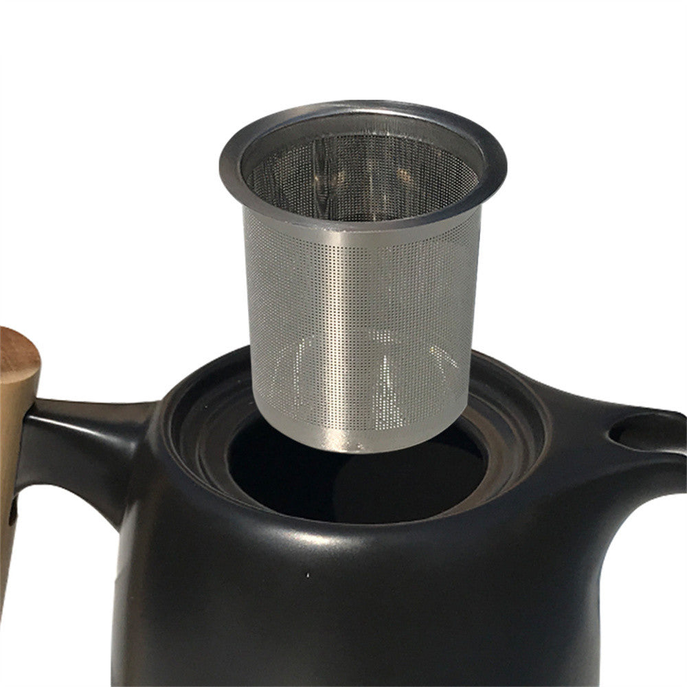 Elegant black porcelain pastoral style portable tea set, featuring an 8-piece set with a small and fresh design, perfect for outdoor tea experiences.