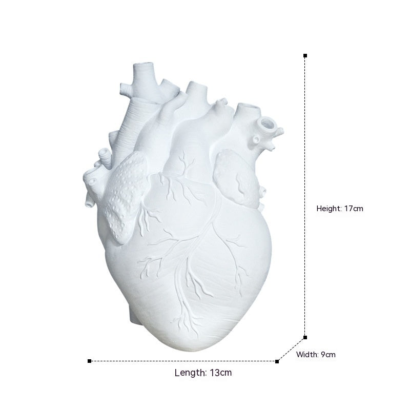 "Art Vase Heart Sculpture β An elegant resin heart sculpture without a base, crafted in American style, perfect for adding a touch of love and sophistication to any room as a decorative ornament."