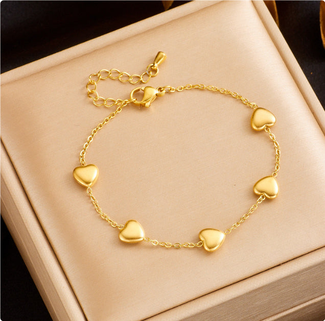 Add a touch of romance and elegance to your jewelry collection with the Sweet Elegance Titanium Steel Necklace & Peach Heart Bracelet. Designed for the modern woman, this set is a beautiful blend of geometry and love-inspired elements, perfect for any occasion.