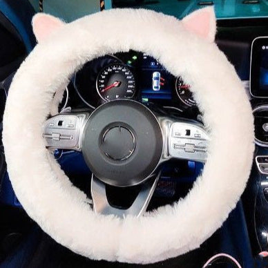 Plush cute car steering wheel cover in various designs including Yugui dog, Meidi, KT cat, and cat ears. Made from soft plush material, fits steering wheels with a 38cm diameter.
