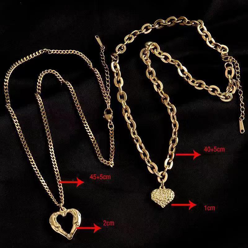 **Love Necklace Gift Set – Stylish & Elegant**
A beautiful **2-piece necklace set** featuring **heart-shaped** and **geometric pendants** made from **high-quality titanium steel**. Available in **silver** and **golden** colors, with **gold inlaid treatment** for a luxurious finish. The **O-shaped chain** adds comfort and style, perfect for women who love elegant, **Korean-style** accessories.
