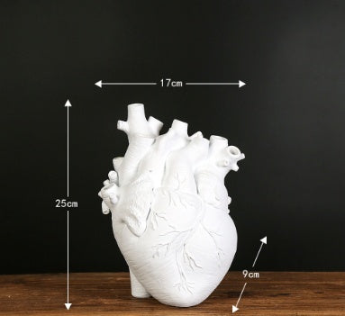 "Art Vase Heart Sculpture β An elegant resin heart sculpture without a base, crafted in American style, perfect for adding a touch of love and sophistication to any room as a decorative ornament."