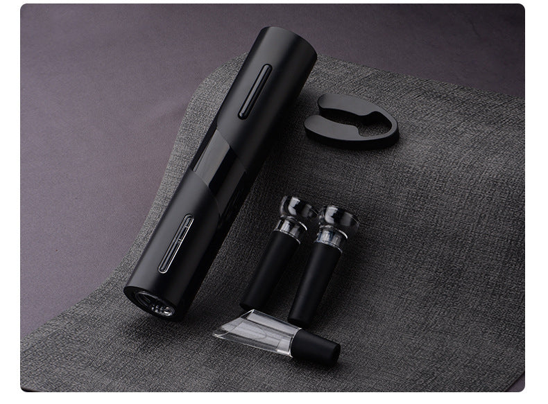 Five-in-One Electric Bottle Opener Set featuring a decanter, paper cutter, pull-out vacuum plug, USB cable, and storage box, all made with durable ABS plastic. A sleek, modern design ideal for various gift-giving occasions.