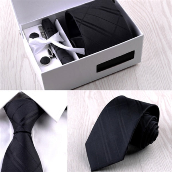 Stylish men’s gift set featuring a premium silk tie, matching cufflinks, and a sleek tie bar, perfect for formal occasions or business wear.