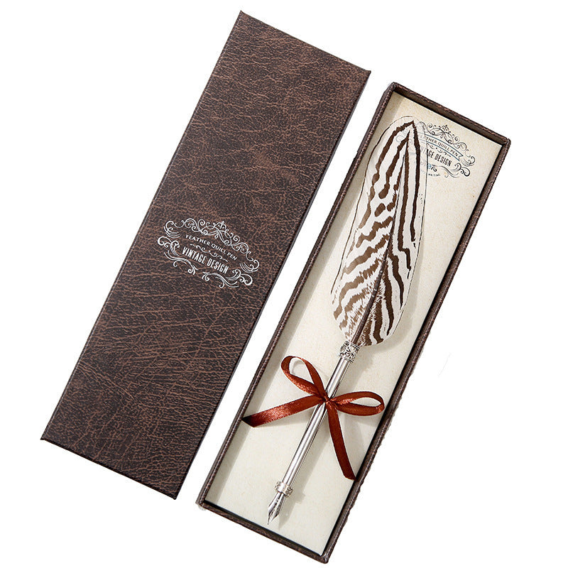 **Elegant Retro Feather Pen Gift Set – Vintage Writing Experience**  

A beautifully crafted **stainless steel feather pen** set in a stylish **gift box**, perfect for writers, calligraphy enthusiasts, and collectors. Timeless design meets smooth writing for an unforgettable experience. Ideal for gifting on any occasion! 🎁✒️