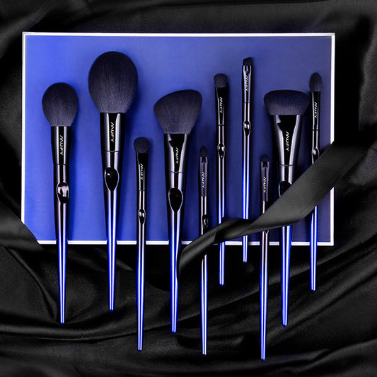 Blue 10-piece makeup brush set featuring soft nylon wool bristles, plastic handles, and a stylish gift box or envelope package, perfect for professional and everyday use.