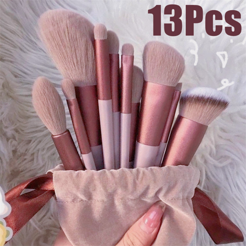 A 13-piece makeup brush set featuring soft synthetic bristles, durable plastic handles, and aluminum ferrules. The set includes brushes for foundation, powder, blush, highlighter, eyeshadow, lip, eyebrow, concealer, and blending. Available in various packaging options such as cloth bags and boxes in green, pink, and yellow. Ideal for professional and personal use, providing precise application and easy cleaning.