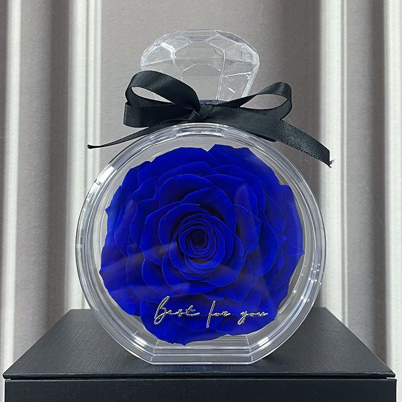 **Rose Gift Box Home Decor – Elegant & Charming 🌹** A stylish **dried flower** arrangement in a **plastic bottle**, available in colors like **Red**, **Pink**, **Sapphire Blue**, and more. Perfect for **Valentine's Day**, **Mother's Day**, and other special occasions. **10x6x14cm**. 🎁