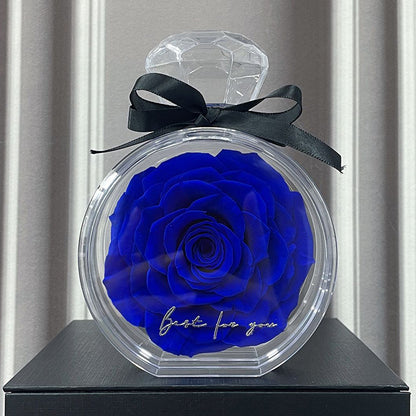 **Rose Gift Box Home Decor – Elegant & Charming 🌹** A stylish **dried flower** arrangement in a **plastic bottle**, available in colors like **Red**, **Pink**, **Sapphire Blue**, and more. Perfect for **Valentine's Day**, **Mother's Day**, and other special occasions. **10x6x14cm**. 🎁