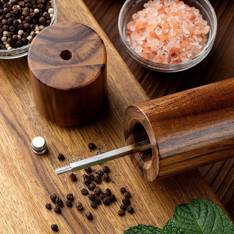 Acacia Mangium 8-inch manual pepper grinder with a ceramic grinding mechanism, available in single, 2-piece, or 3-piece sets. Modern, minimalist design with color box packaging.