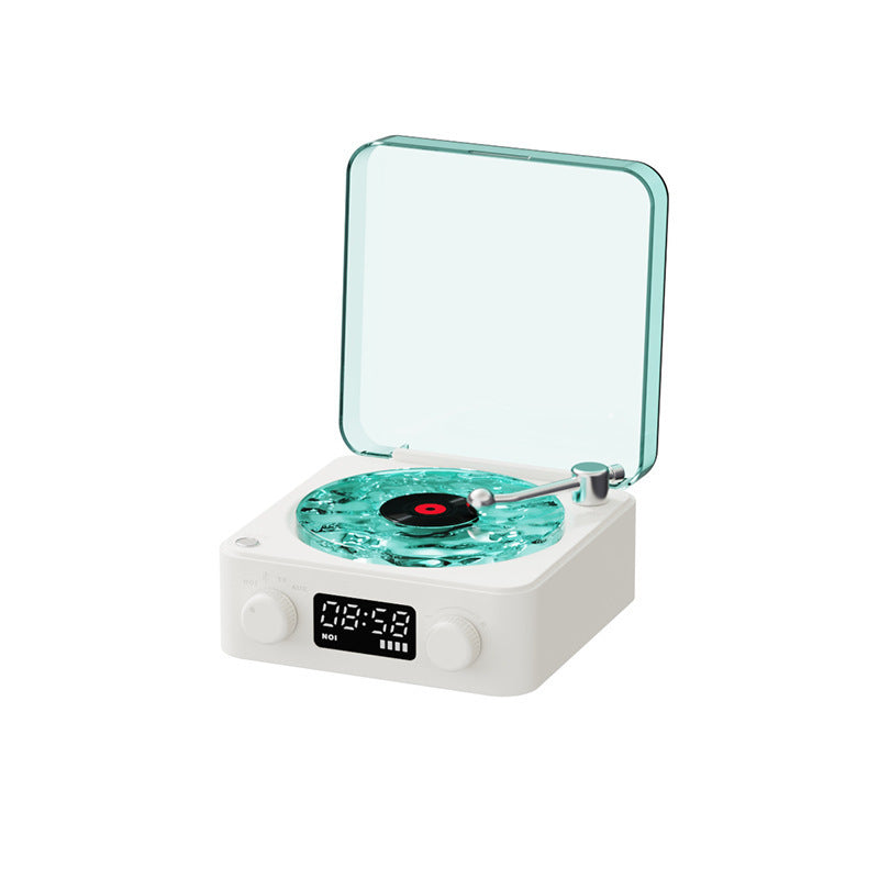 **Retro Turntable Bluetooth Speaker – Vintage Style, Modern Sound 🎶** A portable Bluetooth speaker (142x153x67mm) with a retro design, offering 4 soothing nature sounds like ocean waves and birds. Features 360° surround sound, multiple playback options (Bluetooth, AUX, TF card), and a beautiful breathing light with a transparent turntable. Perfect for parties, relaxation, or enhancing your bedroom ambiance. Available in **blue** and **green**. 🎵