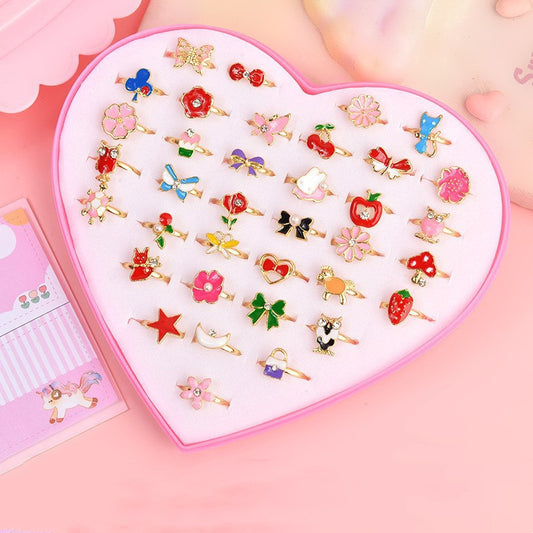 Birthday Gift for Little Girl featuring a Diamond Set Alloy Ring with 36 adjustable rings in a heart-shaped box. Perfect for encouraging creativity and style!