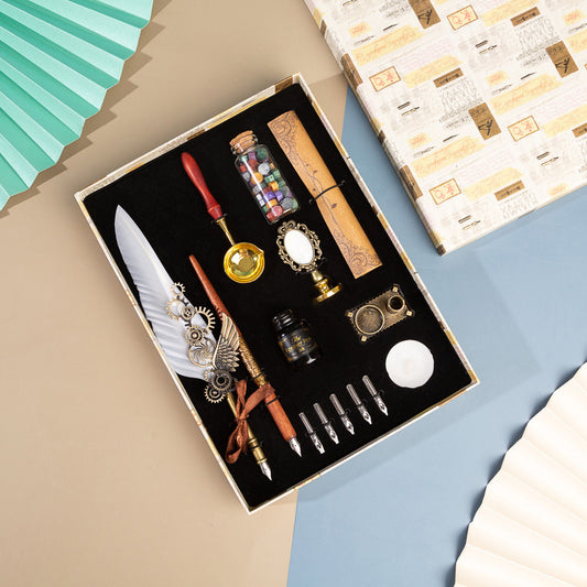 **Business Gift Box Pen Set – Elegant & Crafty 🖋️** A **retro punk-style** pen set with high-quality materials like **brass pen holders**, **natural feathers**, and **wooden components**. Includes **1 feather pen**, **1 wooden dip pen**, **1 candle**, **1 seal**, **1 bottle of wax particles**, **5 replacement tips**, and more, all neatly packaged in a gift box. Available in colors like **wine red, navy blue, black**, and **white**—perfect for gifting or enhancing your workspace. 📜🎁