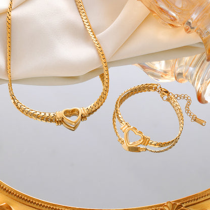 **Love Necklace & Bracelet** – Elegant **heart-shaped jewelry** with a sleek **Cuban chain**. Made from **stainless steel** with an **electroplated finish**, it's stylish, durable, and comfortable to wear. Perfect for any occasion or as a heartfelt gift. 💖