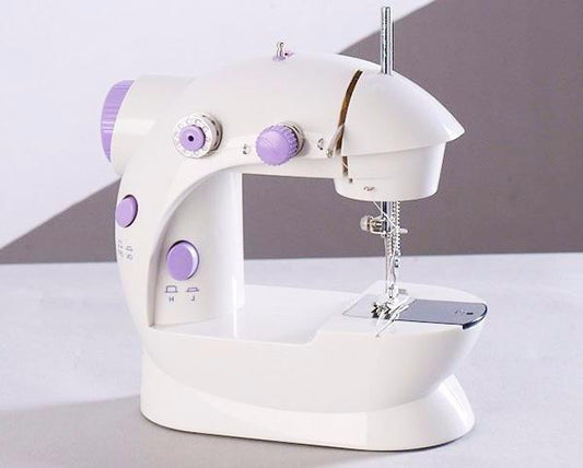 **Electric Mini Household Sewing Machine – Compact & Easy to Use! 🧵✨** A lightweight and portable sewing machine (20x15x10cm) with electric operation, classic straight stitching, and sewing cylinder functionality. Made from high-quality ABS, POM, and PC for durability. Features a built-in thread cutter, lighting, and power supply for convenience. Includes an English manual for easy setup—perfect for home sewing and DIY projects! 🪡