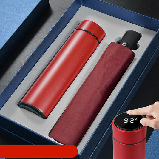 Business automatic umbrella with one-button open/close, lightweight at 380g, paired with a sleek 304 stainless steel mug available in three color options.