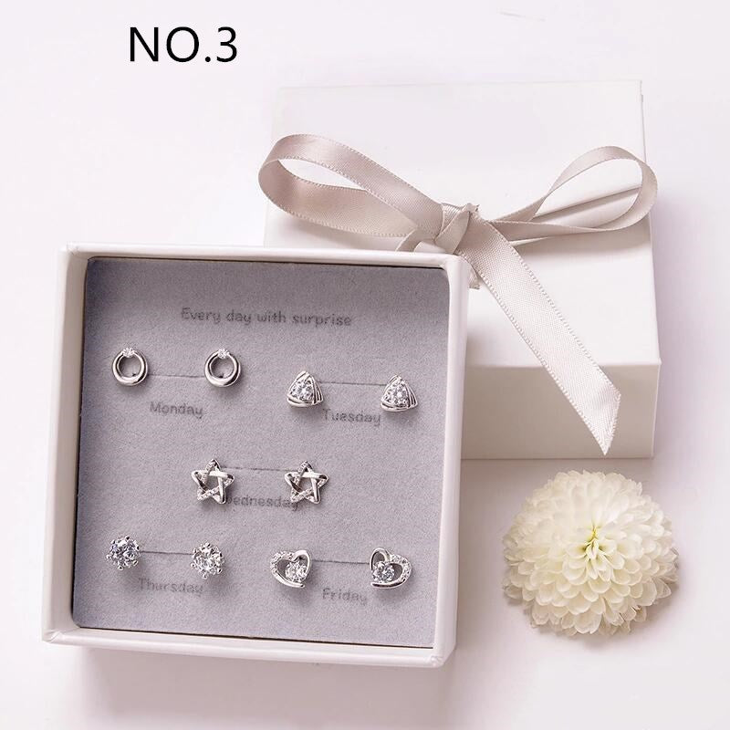 A pair of elegant geometric earrings crafted from copper plated with real platinum, packaged individually for a sophisticated look.
