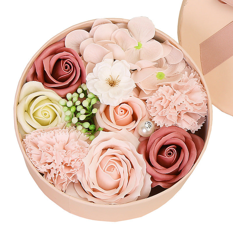 Delight your loved ones with the Soap Flower Gift Box, a beautifully handcrafted bouquet of delicate soap roses presented in a stylish gift box. Perfect for any occasion, this exquisite arrangement combines elegance with a soft, refreshing fragrance, making it a luxurious and meaningful gift.