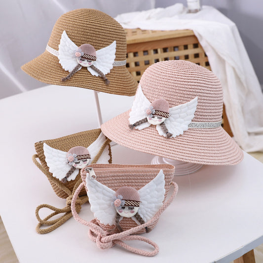 Adorable children's straw hat and matching bag set, featuring a wide-brimmed dome top hat with flat eaves and floral details. Made for ages 2-8, perfect for sunny outdoor adventures.