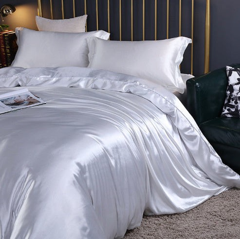**Solid Color Double-Sided Silk Satin Bed Sheet Set – Luxurious & Soft**  

A **premium silk** **four-piece bedding set** with a **smooth satin finish**, **tassel weaving**, and **reactive dyeing** for long-lasting color. Ultra-soft, breathable, and stylish—perfect for a luxurious sleep experience. 🛏✨