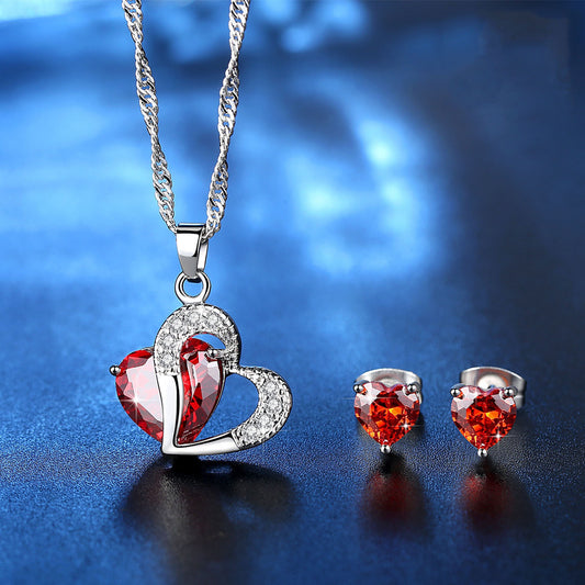 Ziling Heart Necklace and Earrings Set featuring 6mm stud earrings and a 25mm x 20mm pendant, made of copper and zircon, with a 45+5cm chain, available in red, purple, and white.