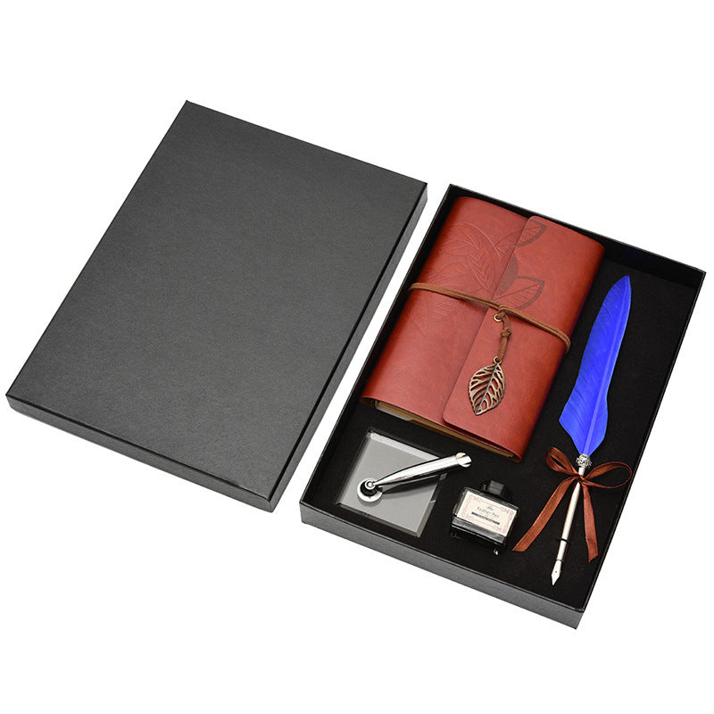 **Feather Dip Pen Gift Set – Vintage Elegance ✒️** A stunning **copper pen** with a **natural feather dip pen**, complete with **ink bottle**, **acrylic base pen insert**, and **antique book**. Box size: **25.7 x 20.7 x 5.5cm**. Perfect for writers and those who appreciate a touch of **retro charm**. ✨