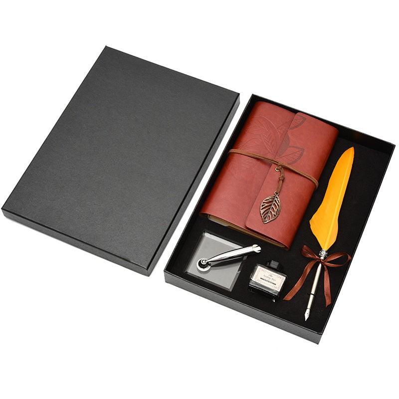 **Feather Dip Pen Gift Set – Vintage Elegance ✒️** A stunning **copper pen** with a **natural feather dip pen**, complete with **ink bottle**, **acrylic base pen insert**, and **antique book**. Box size: **25.7 x 20.7 x 5.5cm**. Perfect for writers and those who appreciate a touch of **retro charm**. ✨