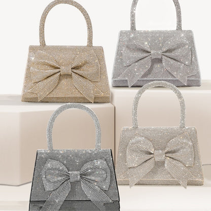 Step into the world of luxury and sophistication with the Elegant Full-Diamond Bow Handbag, a true statement piece that combines timeless elegance with a modern edge. Designed for the fashion-forward, this handbag is a stunning blend of street trend and light luxury style.