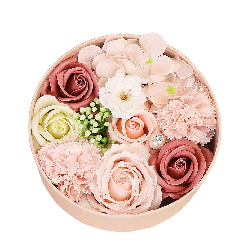 Delight your loved ones with the Soap Flower Gift Box, a beautifully handcrafted bouquet of delicate soap roses presented in a stylish gift box. Perfect for any occasion, this exquisite arrangement combines elegance with a soft, refreshing fragrance, making it a luxurious and meaningful gift.