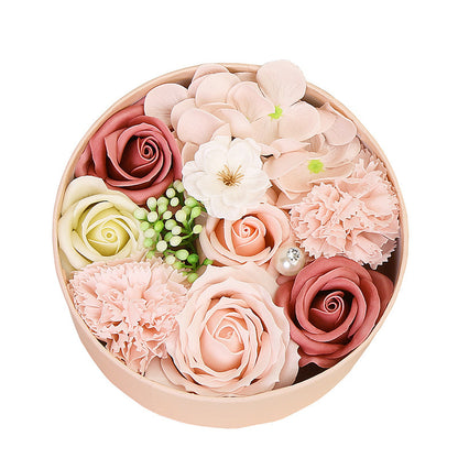 Delight your loved ones with the Soap Flower Gift Box, a beautifully handcrafted bouquet of delicate soap roses presented in a stylish gift box. Perfect for any occasion, this exquisite arrangement combines elegance with a soft, refreshing fragrance, making it a luxurious and meaningful gift.