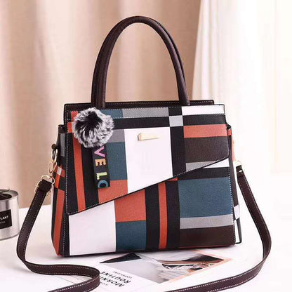 Stylish ladies one shoulder bag in two sizes (small and large), featuring a sleek design with a portable handle. Perfect for carrying essentials with a modern, elegant touch.