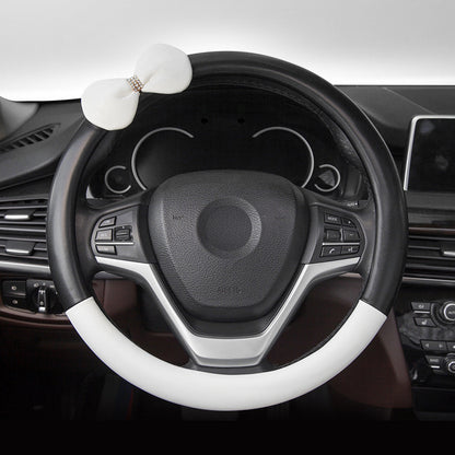 Cute microfiber leather car steering wheel cover, designed for comfort and style. Fits 95% of vehicle models with a size of 38.0 cm x 38.0 cm x 4.0 cm.