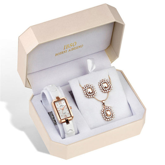**Fashion Rhinestone Women's Watch & Jewelry Set – Elegant & Sparkling**  

A stylish **women’s quartz watch** with a **34mm round dial**, **9mm slim case**, and dazzling **rhinestone accents** for a luxurious look. Made with **a durable metal case, mineral-strengthened glass mirror, and an alloy strap** with a **stainless steel pin buckle**. **30M waterproof** and precision quartz movement for reliability.  

Includes a **matching jewelry set** with a **46cm necklace (21mm x 16mm pendant) and 18mm x 16mm e